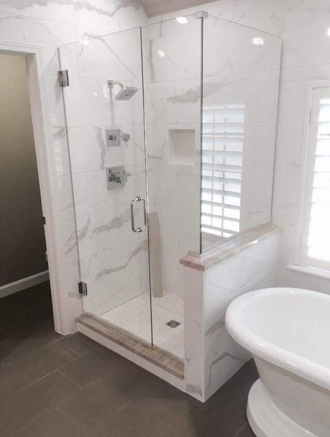 Shower Doors — Bathroom with Glass Shower Wall in Stillwater, OK
