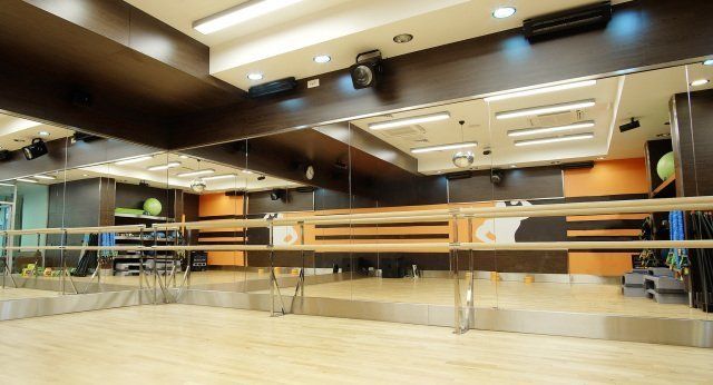 Commercial Glass in Stillwater — Mirror at the Back of Bench CHair in Stillwater, OK