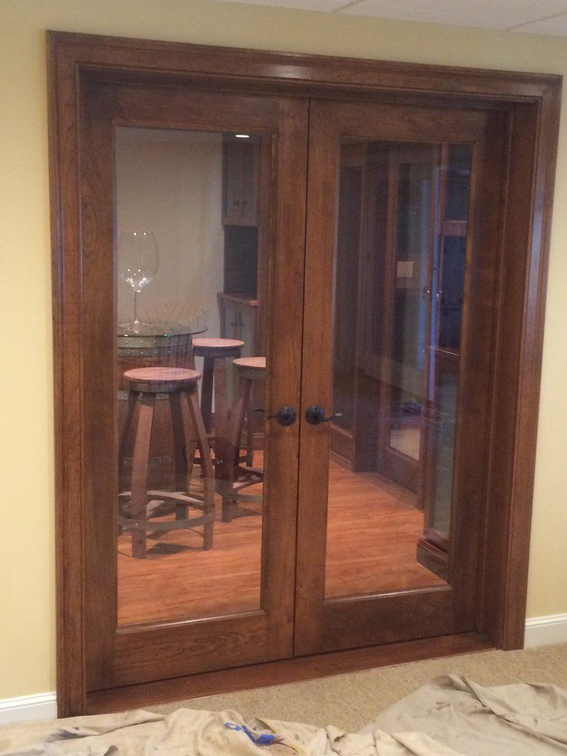 View through cherry doors from the living room into the Tasting Room
