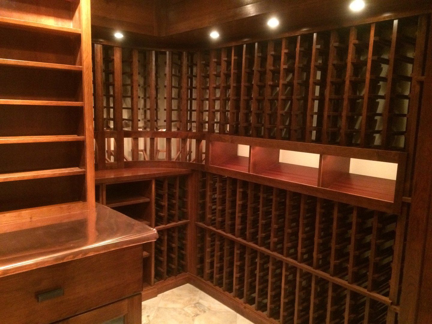 View of copper top, display row and individual wine racks