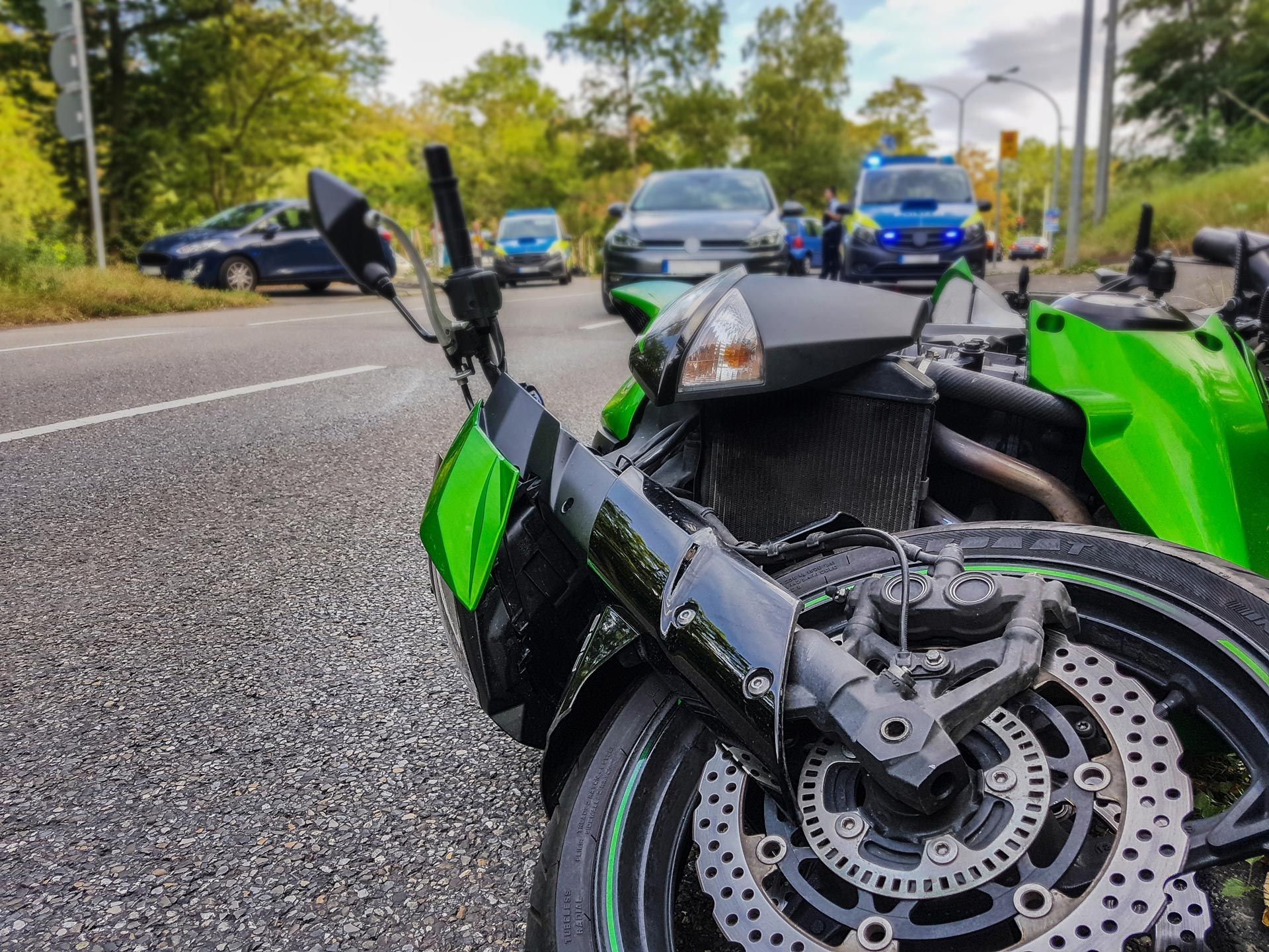 Accident with a sport motorcycle on the road.