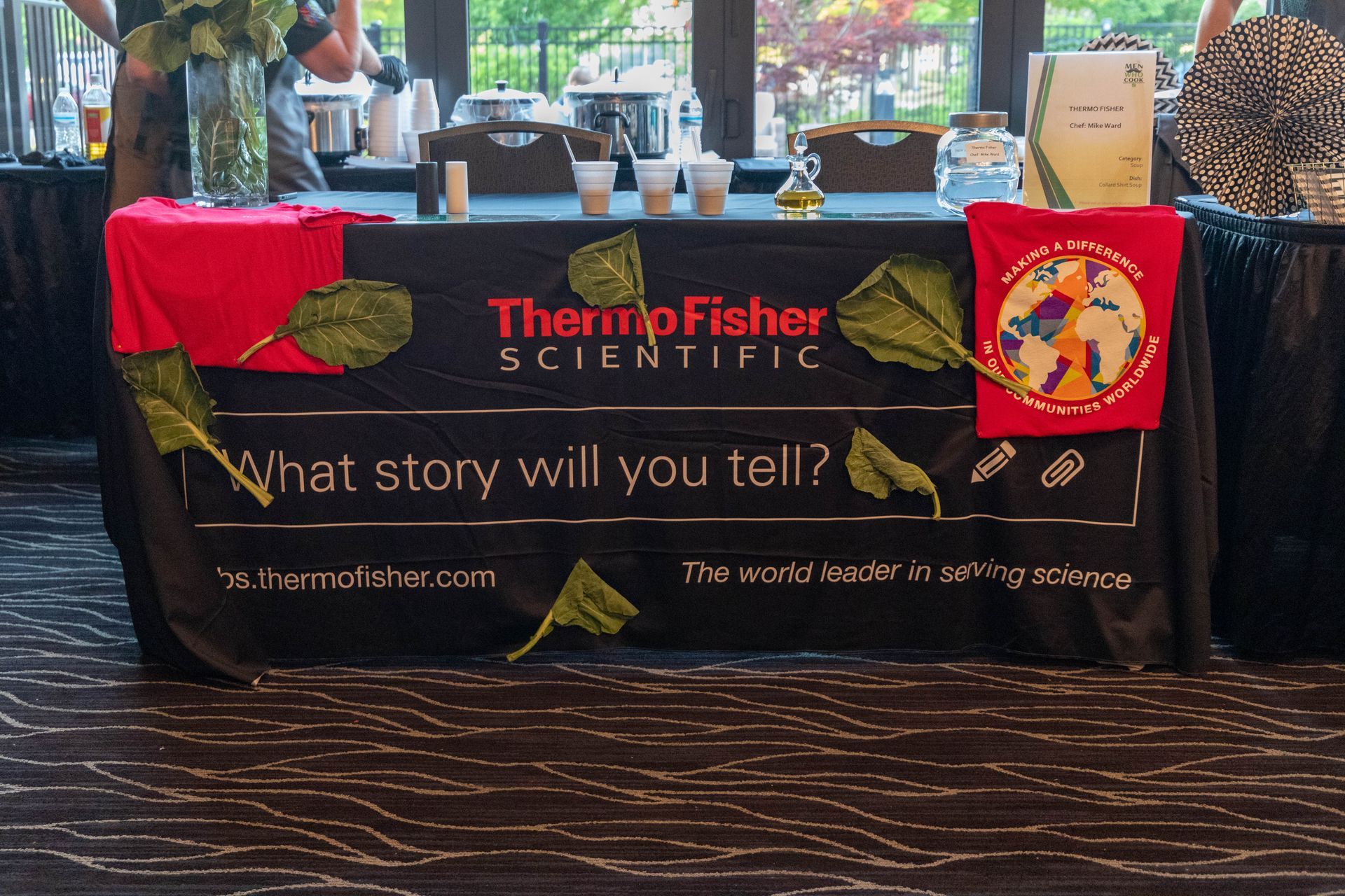 a table with a thermo fisher scientific sign on it