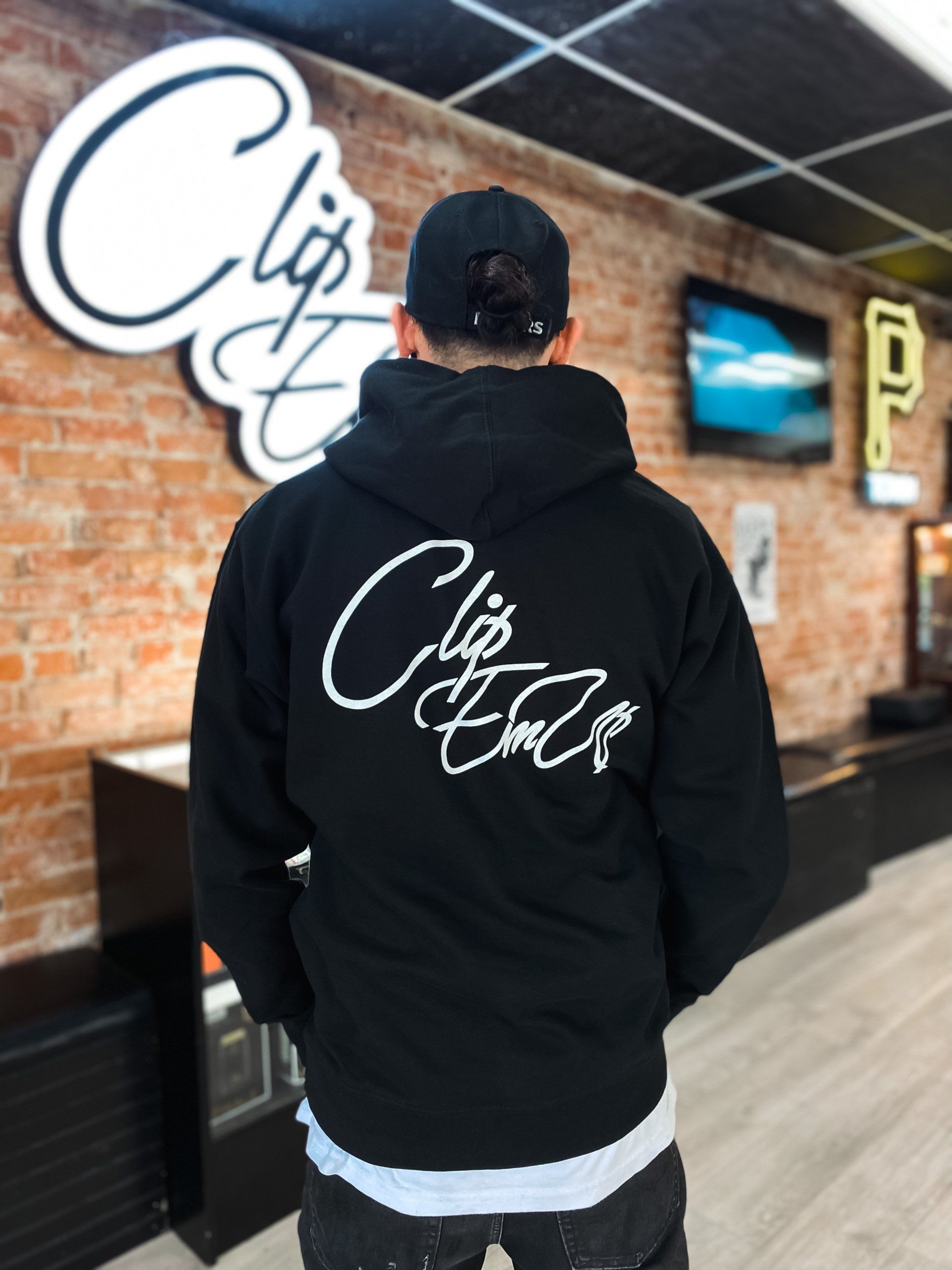 Black Hoodie with Clip Em' Up staple logo