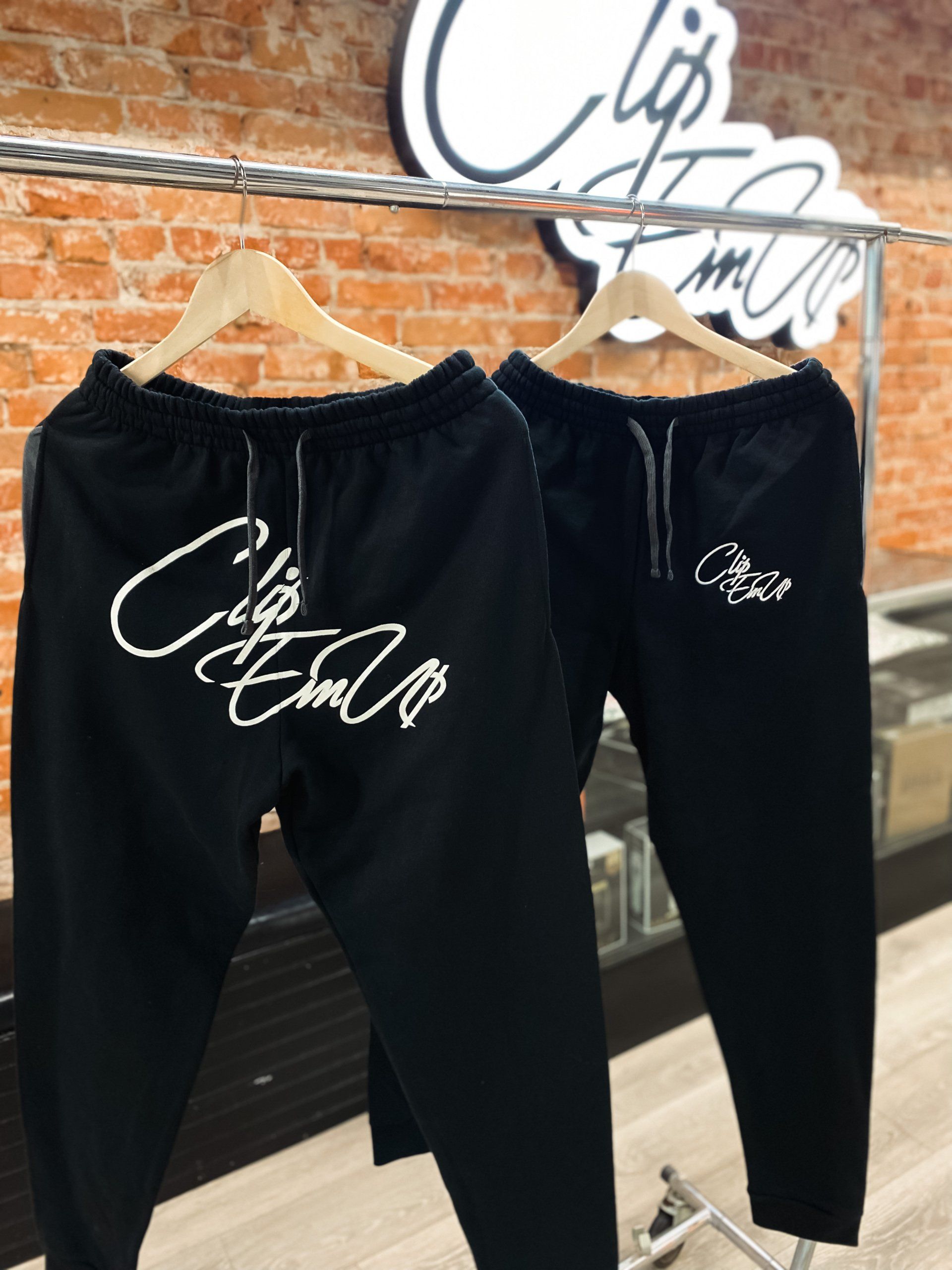Black Joggers and sweatpants with Clip Em' Up staple logo