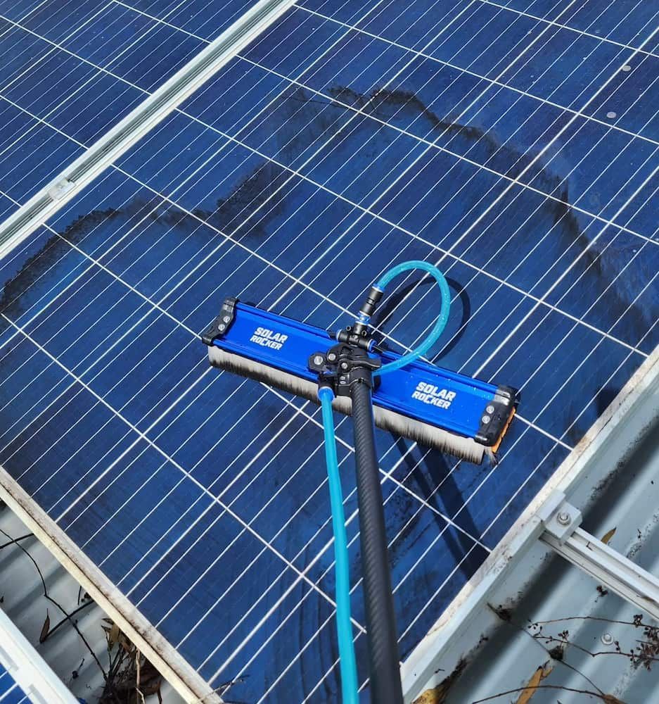 Solar Panel Cleaning Tool, Blue Brush, Black Pole, on Solar Panels — Rapid Rinse Solutions in Katunga, VIC
