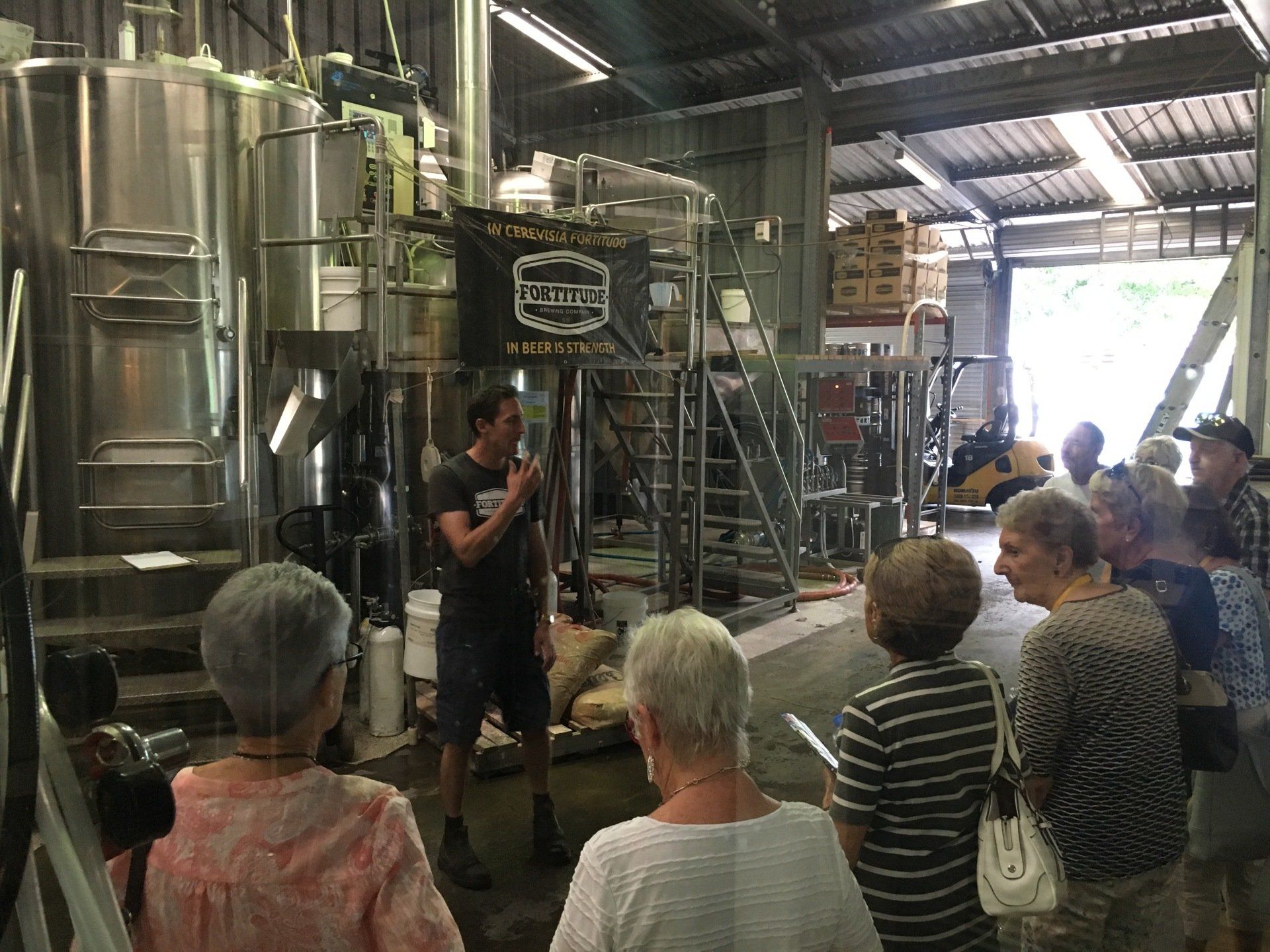 group of friends enjoying a party in a park