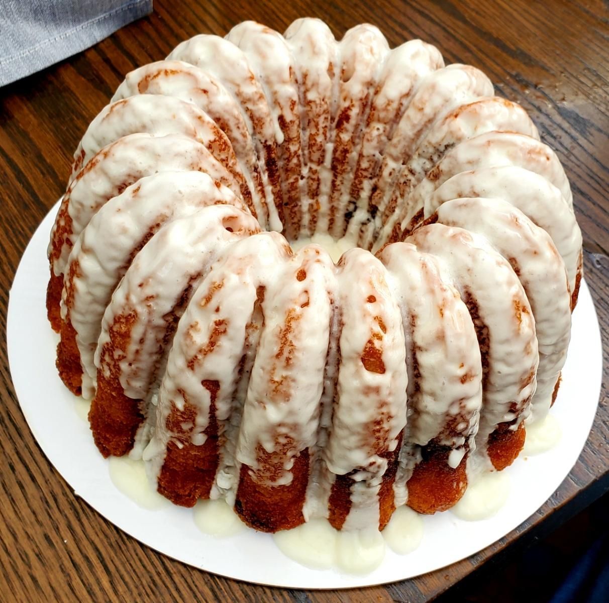 A bundt cake with icing on top of it