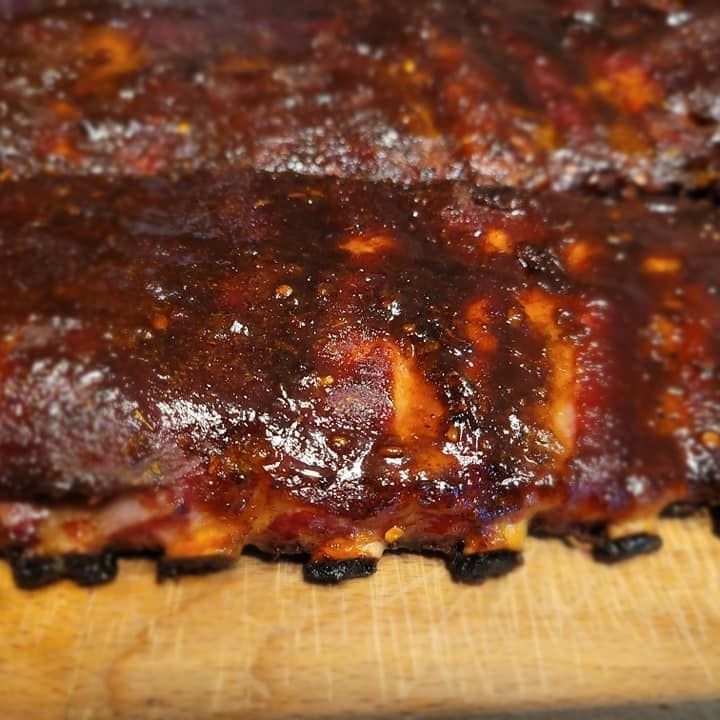 A close up of a piece of meat on a cutting board