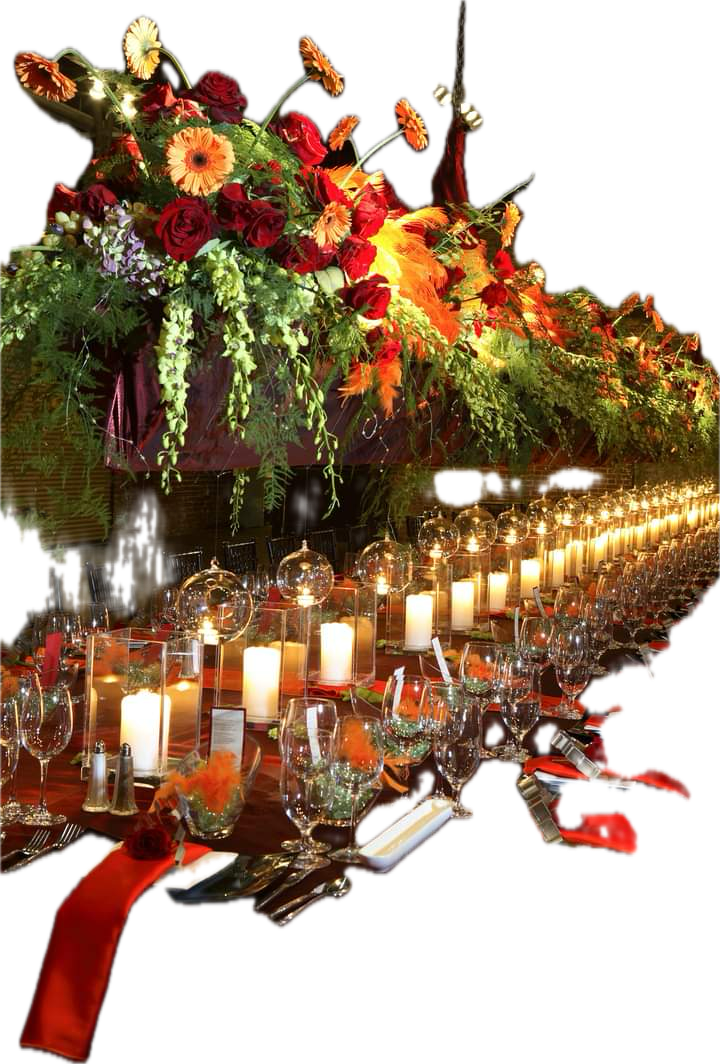 A long table with candles and flowers on it