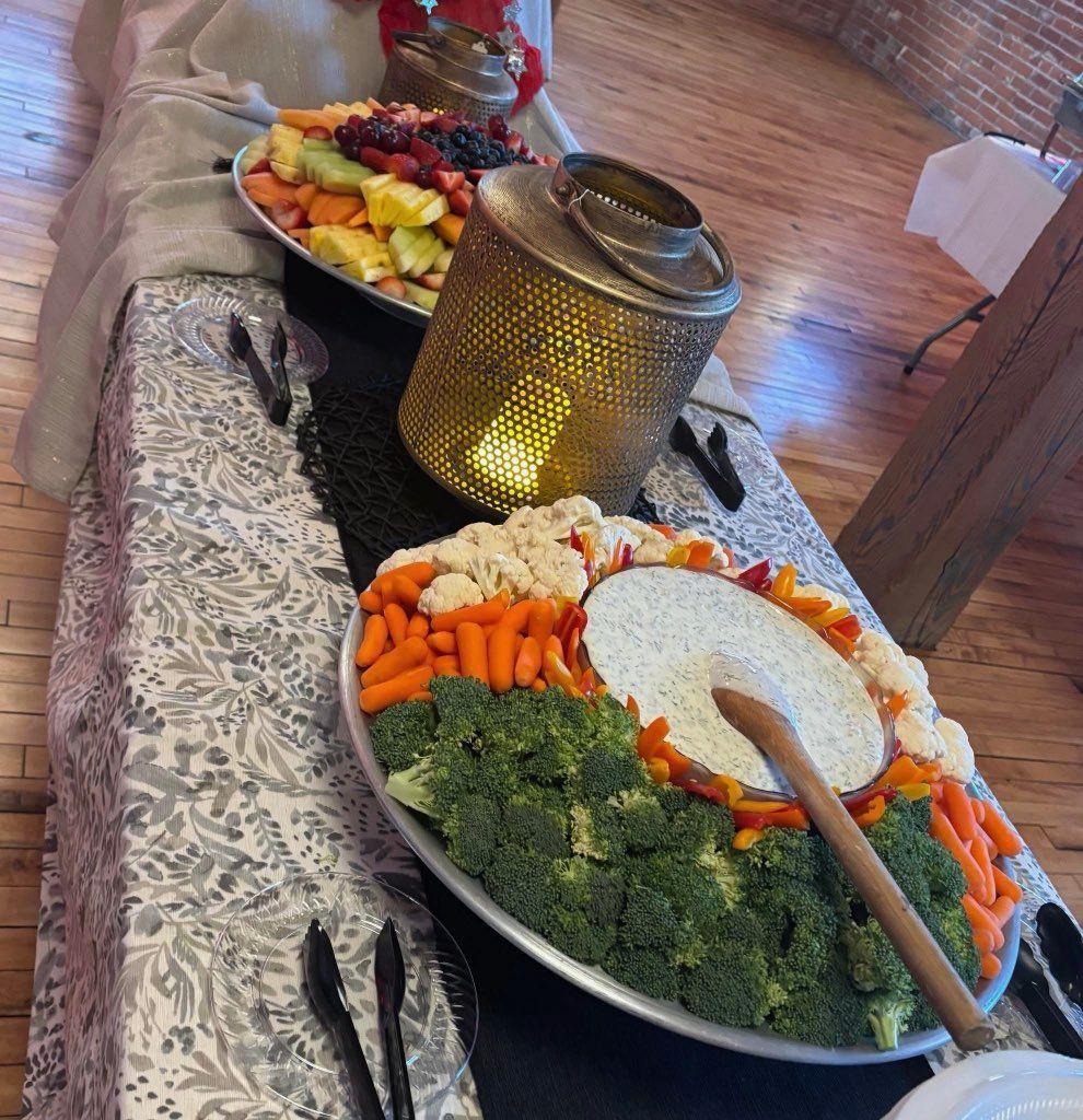 A table with a variety of vegetables and fruit on it
