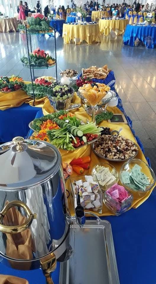 There is a buffet table with a lot of food on it.