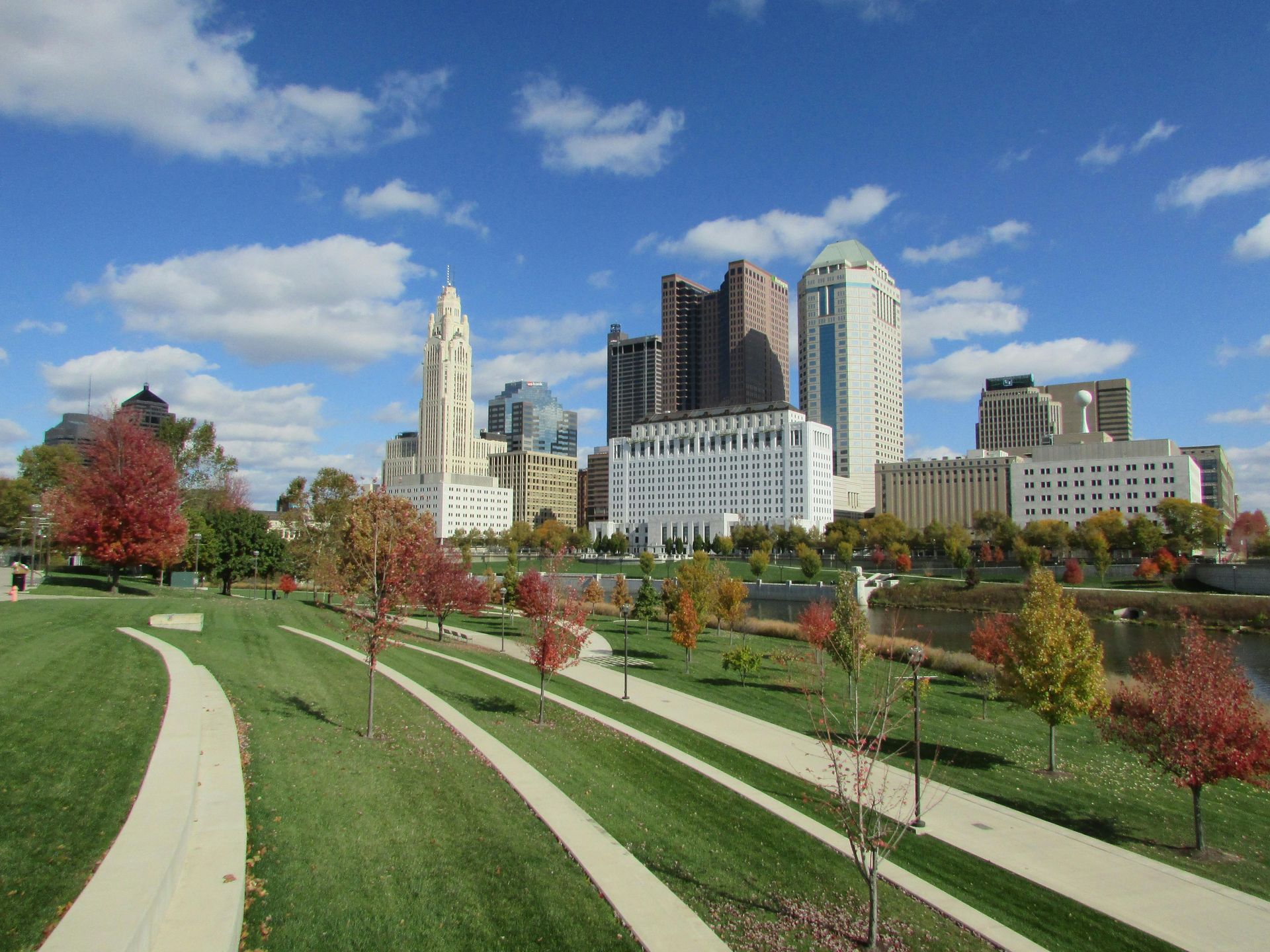 A city skyline with a hotel in the foreground