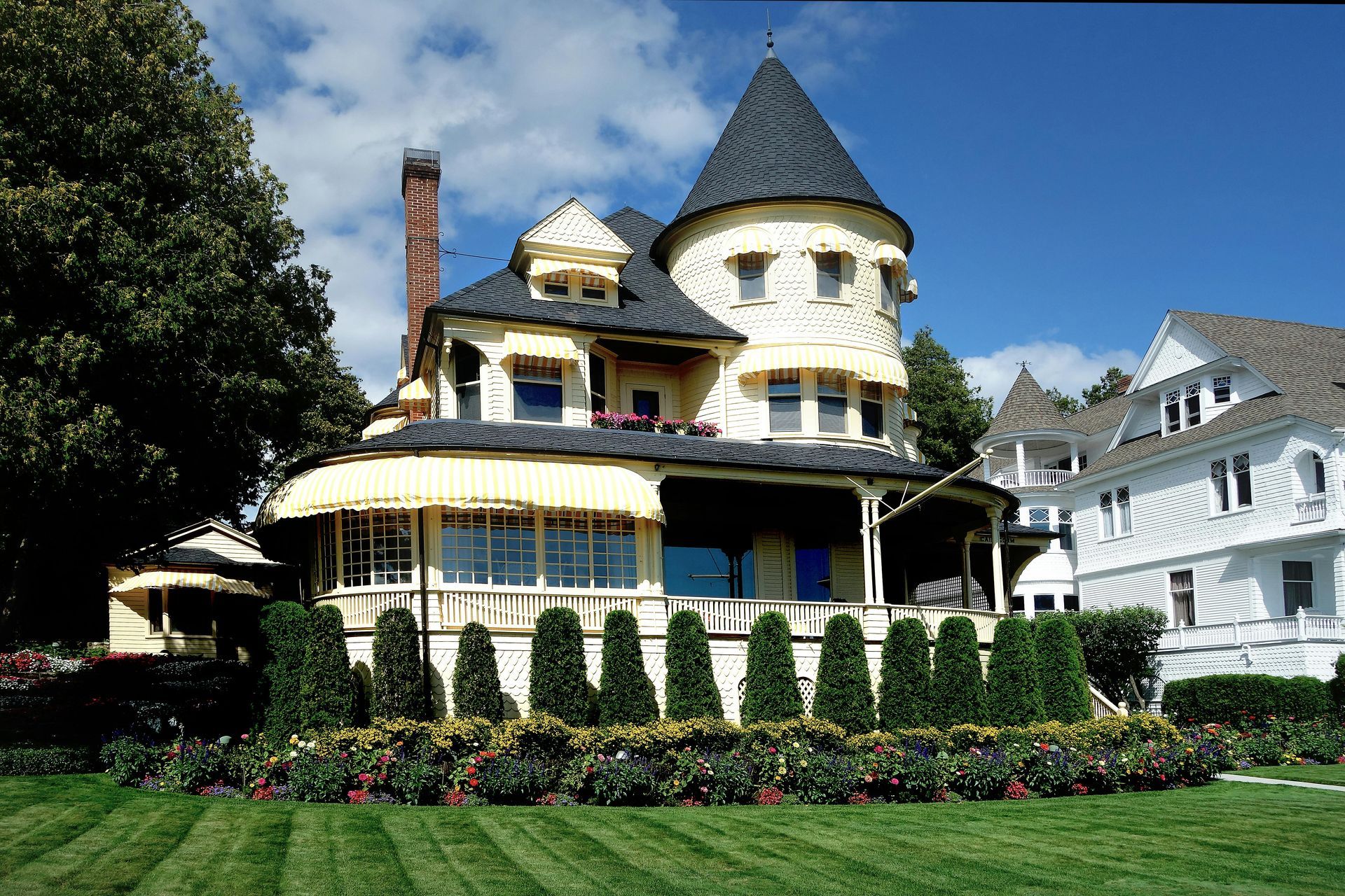 A large house with a tower on top of it