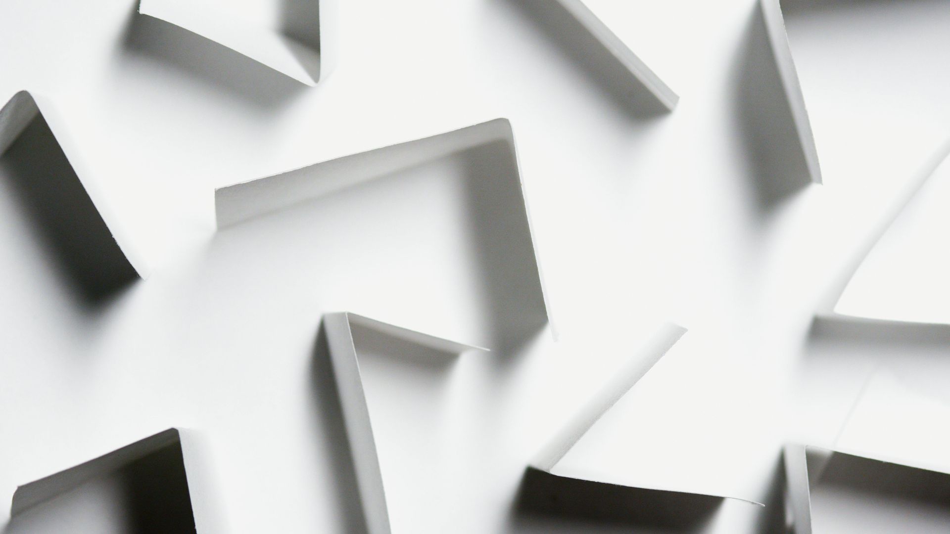 A white background with a pattern of triangles on it
