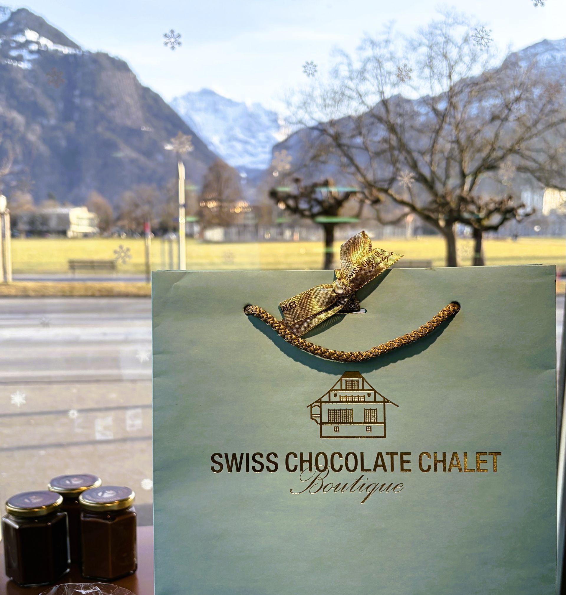 Swiss Chocolate Chalet gift bag with Jungfrau mountain in background