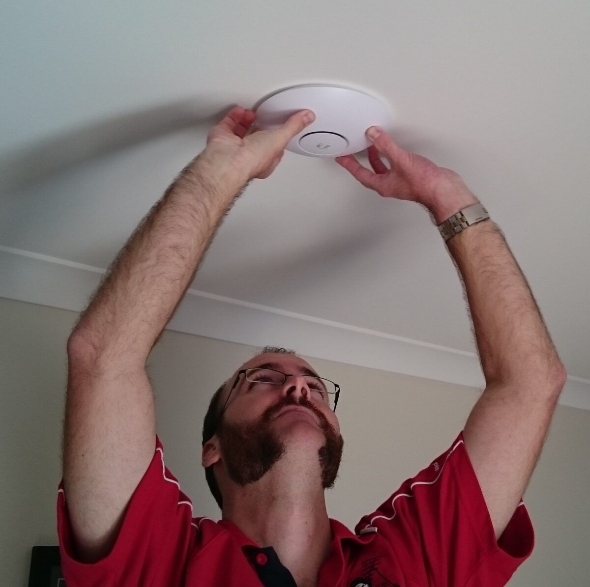 CALLIT IT Infrastructure specialist installing enterprise-grade Wi-Fi in a corporate office in Dubai