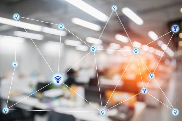 Enterprise office with ceiling-mounted Wi-Fi access points ensuring seamless connectivity