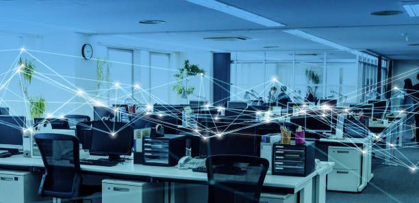 Modern office with multiple Wi-Fi mesh nodes providing seamless internet coverage across workstations