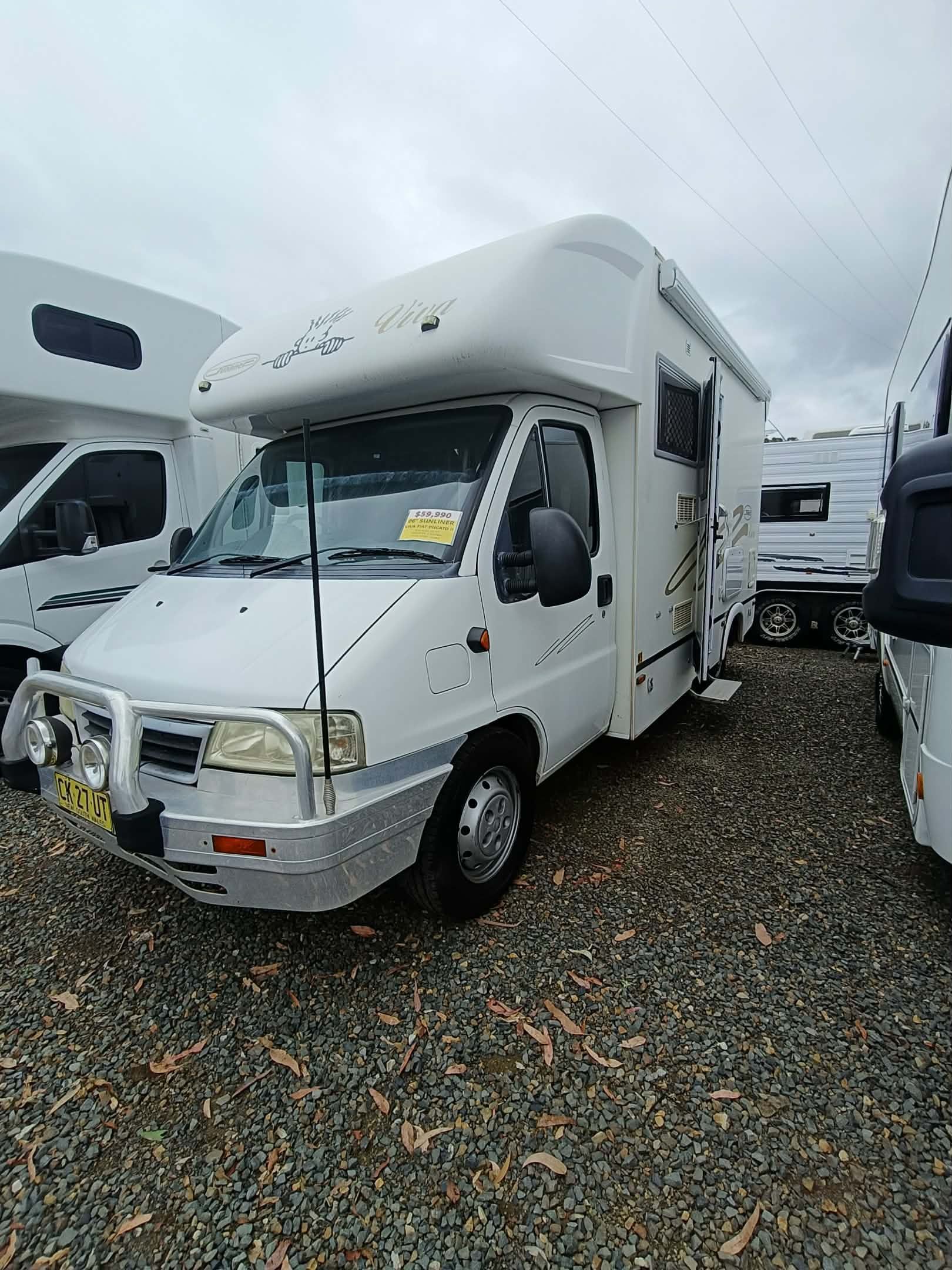 White Campervan Parked — Great Lakes Caravans & RV P/L In Nabiac, NSW