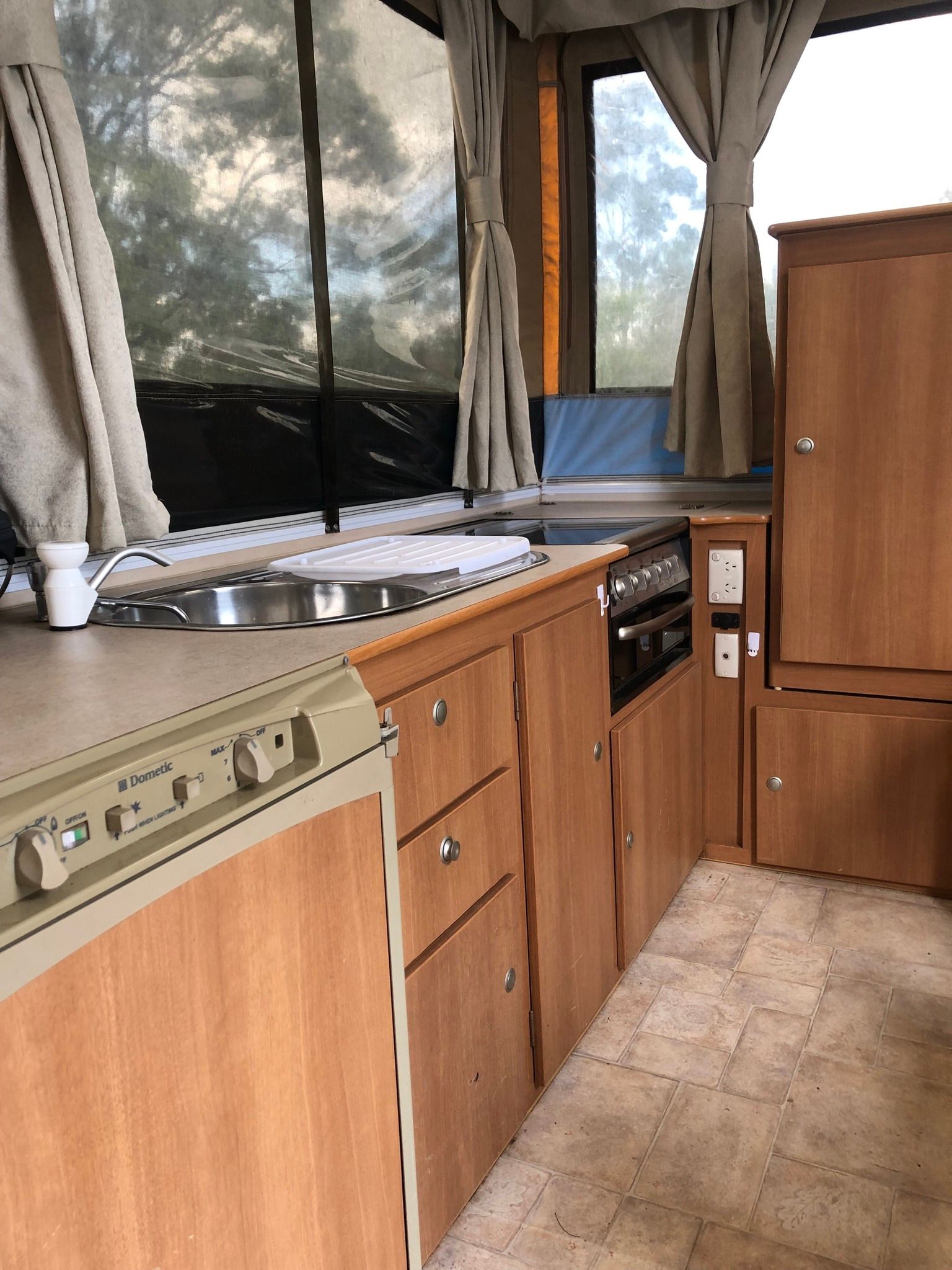 Interior of a Pop-up Camper With a Kitchen Area — Great Lakes Caravans & RV P/L In Mid North Coast, NSW