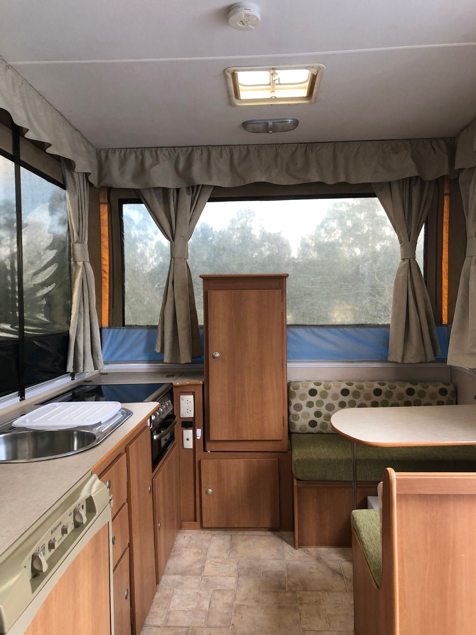 Interior View of a Pop-up Camper With a Kitchen — Great Lakes Caravans & RV P/L In Nabiac, NSW
