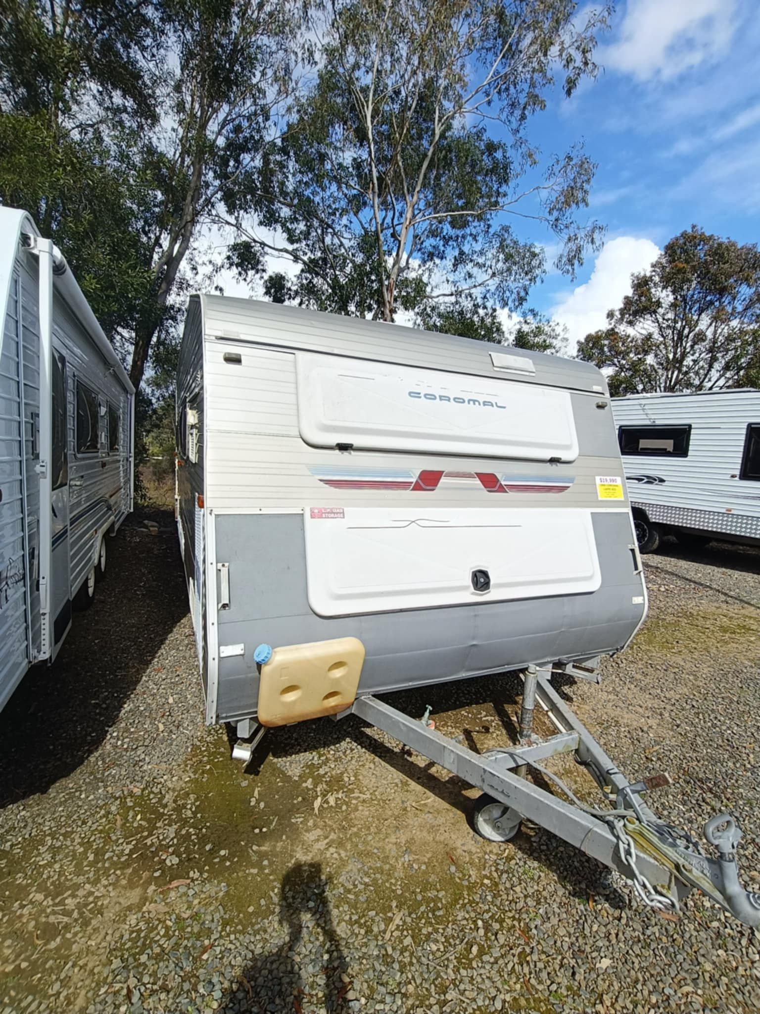 Grey and White Caravan Parked on Gravel — Great Lakes Caravans & RV P/L In Hunter Valley, NSW