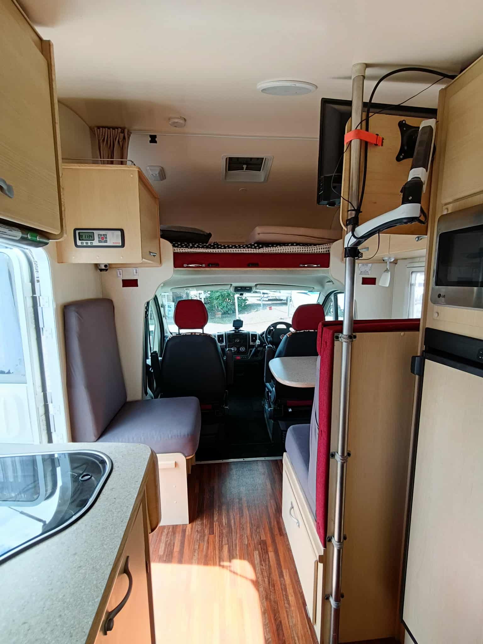 Interior of a Camper Van With Wood Flooring — Great Lakes Caravans & RV P/L In Mid North Coast, NSW