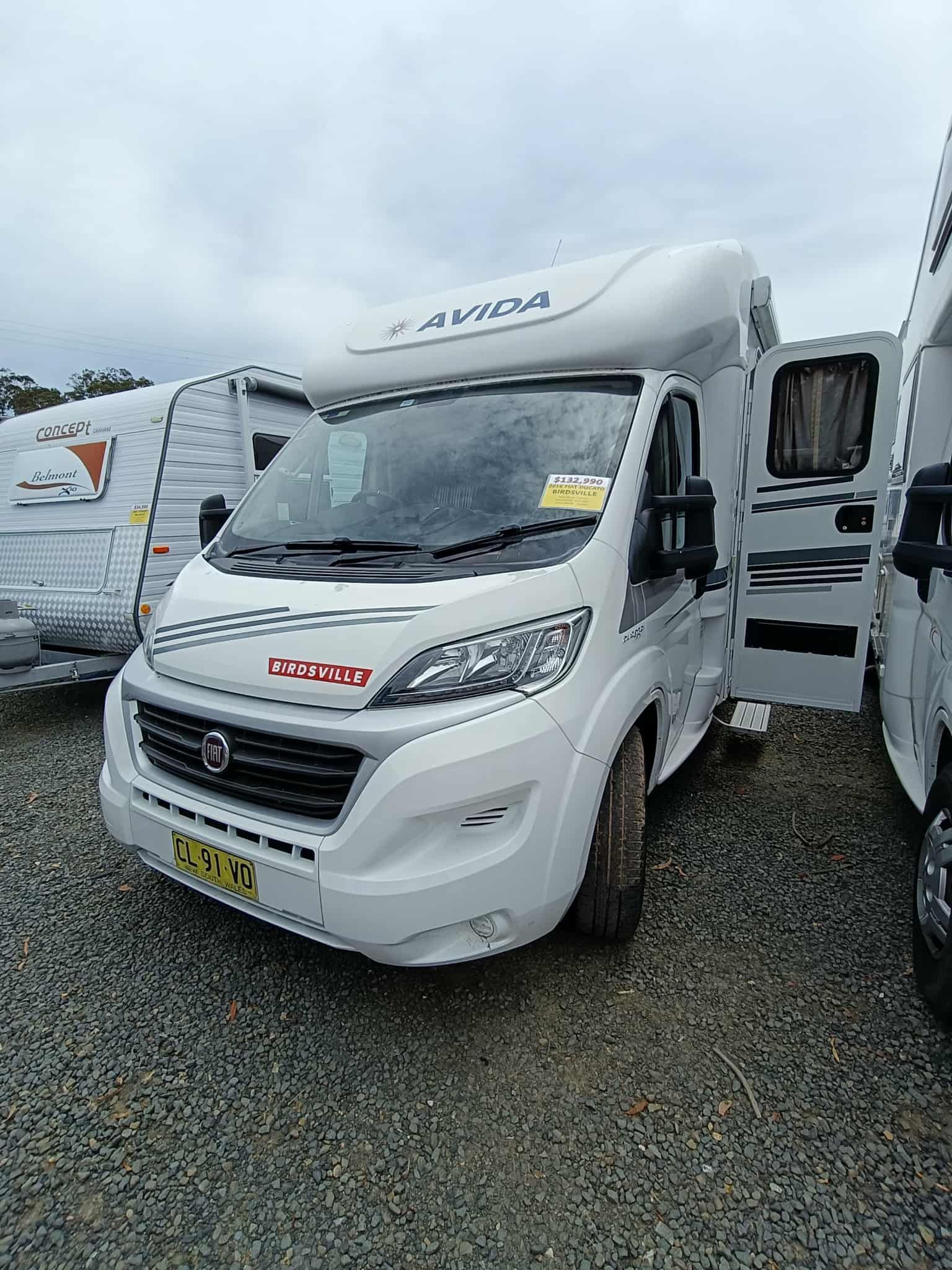 White Avida Motorhome With Open Door — Great Lakes Caravans & RV P/L In Hunter Valley, NSW