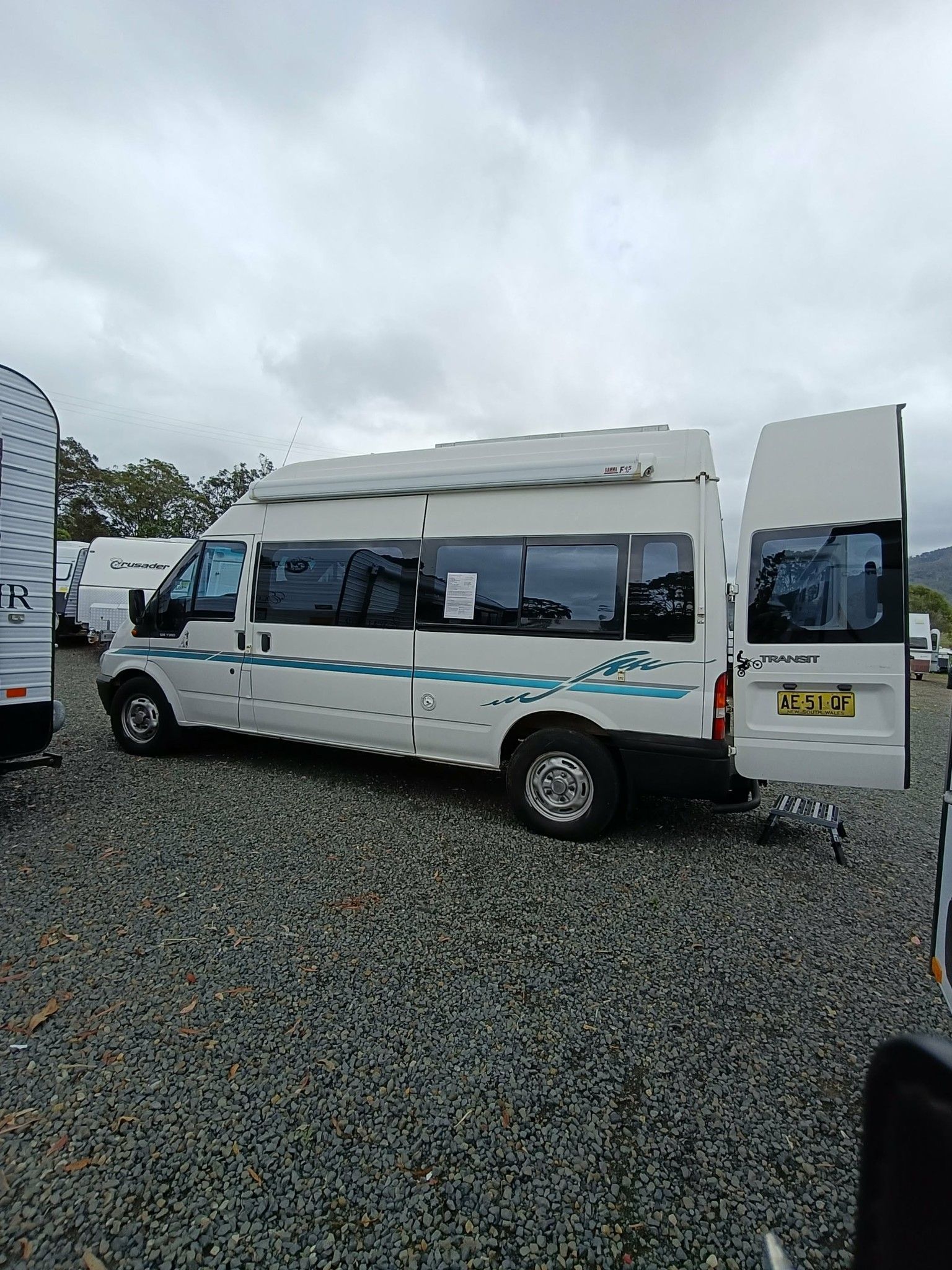 White Campervan With Open Rear Door — Great Lakes Caravans & RV P/L In Taree, NSW