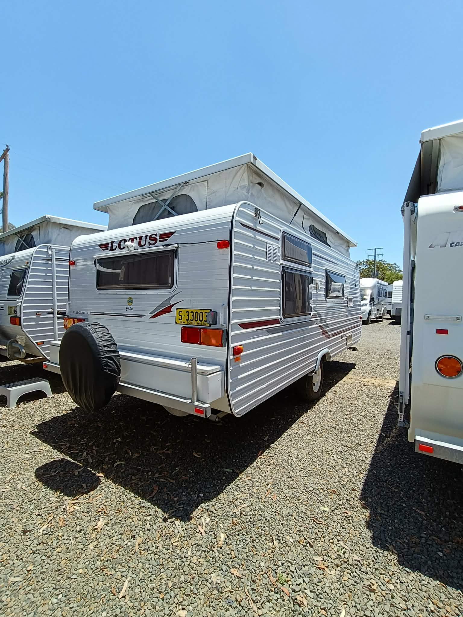 Silver Travel Trailer With Spare Tire — Great Lakes Caravans & RV P/L In Newcastle, NSW
