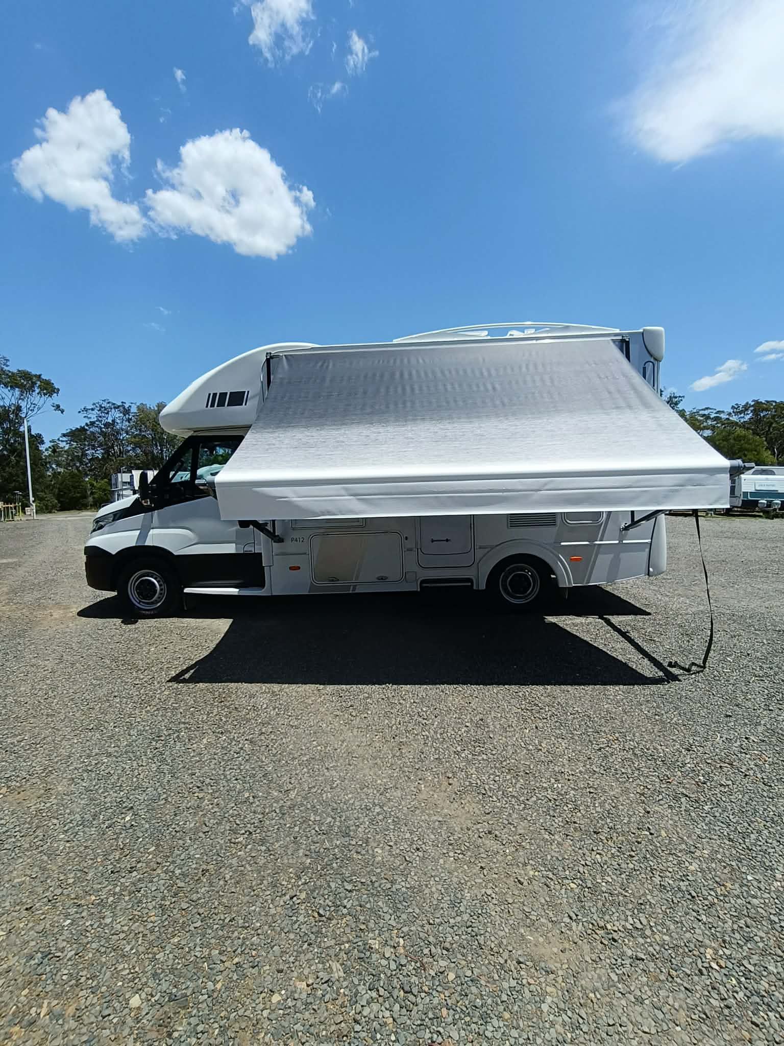 White Campervan With Awning Extended — Great Lakes Caravans & RV P/L In Forster, NSW