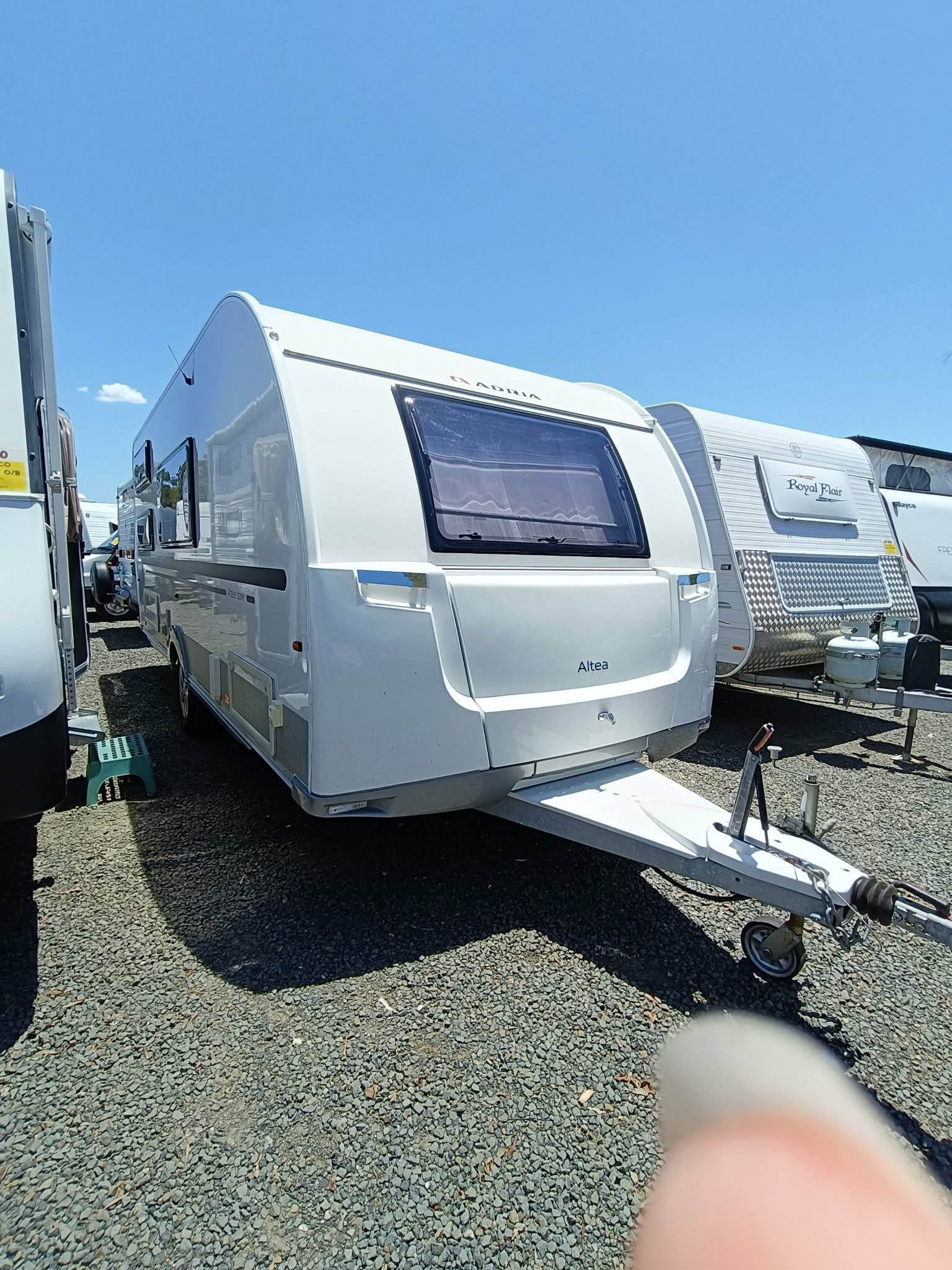 Travel Trailer Parked on Gravel With Blue Sky — Great Lakes Caravans & RV P/L In Nabiac, NSW