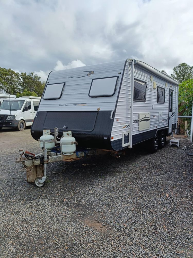Gray and Black Caravan Parked on Gravel — Great Lakes Caravans & RV P/L In Nabiac, NSW
