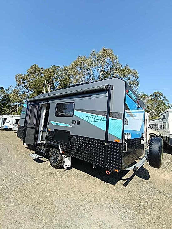 Grey and Blue Caravan Parked on Gravel — Great Lakes Caravans & RV P/L In Nabiac, NSW
