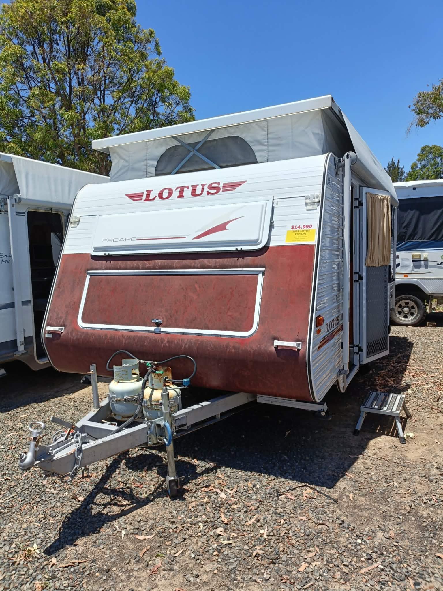 Brown and White Lotus Pop-top Caravan Parked Outdoors — Great Lakes Caravans & RV P/L In Nabiac, NSW