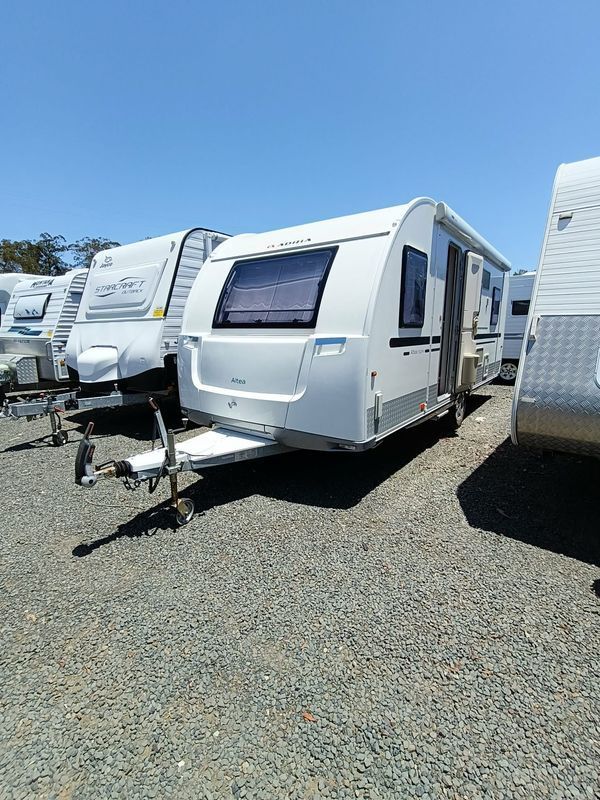White Caravan Parked on Gravel, With Other Caravans — Great Lakes Caravans & RV P/L In Nabiac, NSW