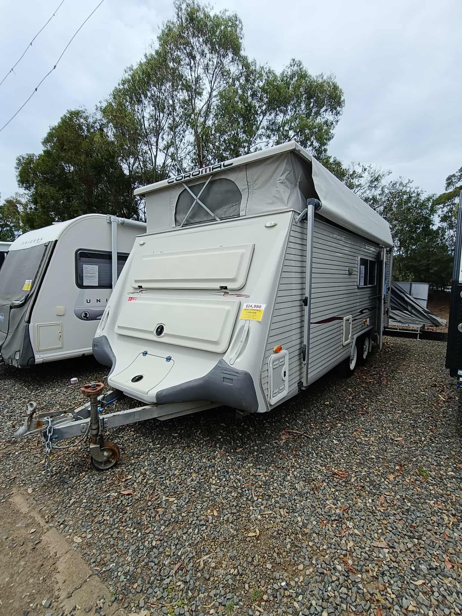 Light-colored Pop-top Caravan Parked on Gravel — Great Lakes Caravans & RV P/L In Nabiac, NSW