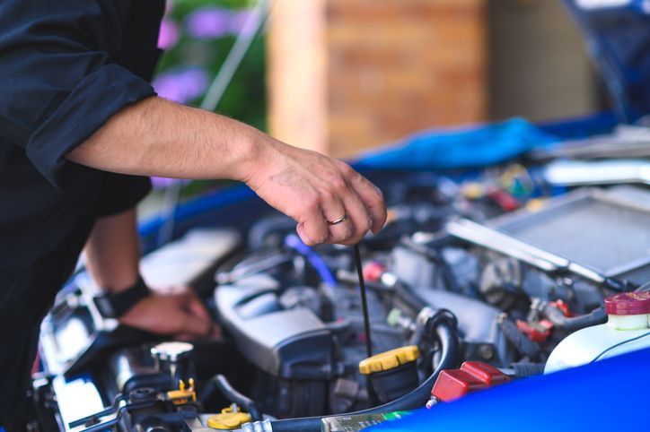 Cropped Hands of Mechanic Maintain Car, Engine Oil Check and Replace | Canberra, Act | Auto Drive Transmission