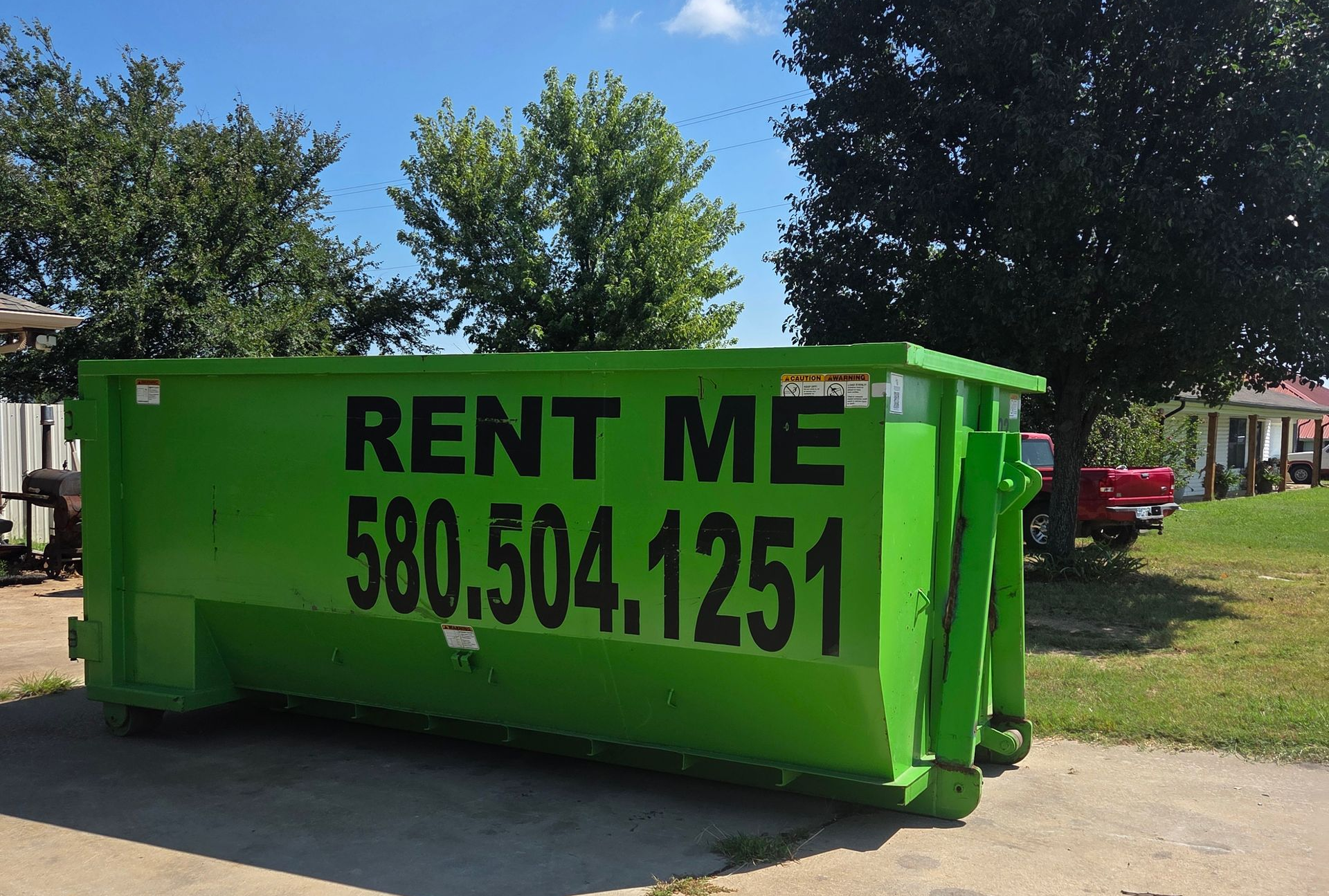 Green dumpster with 