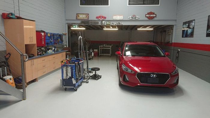Red Car in Workshop — Penrith NSW — Dent Ezy Fix P/L
