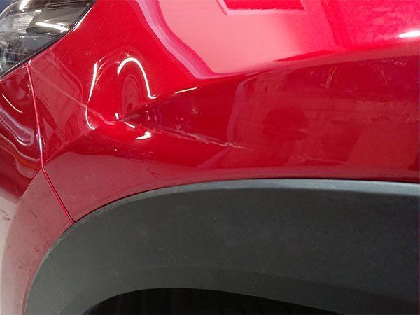Red Car Before — Penrith NSW — Dent Ezy Fix P/L