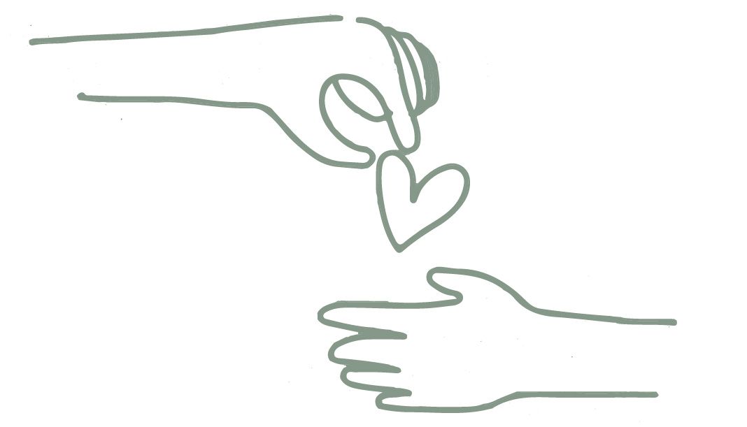 Eine Hand übergibt der andern Hand ein Herz.