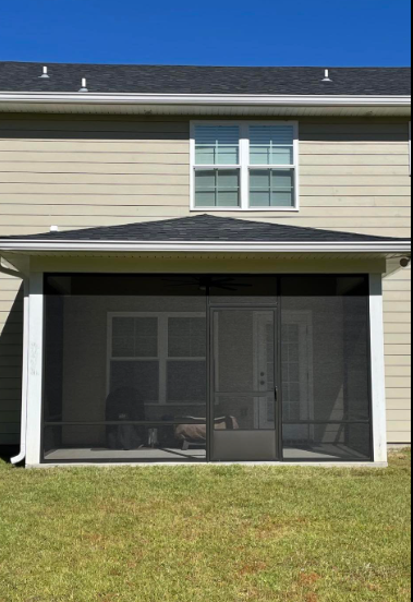 The Back Of A House With A Screened In Porch — Richmond Hill, GA — A Plus