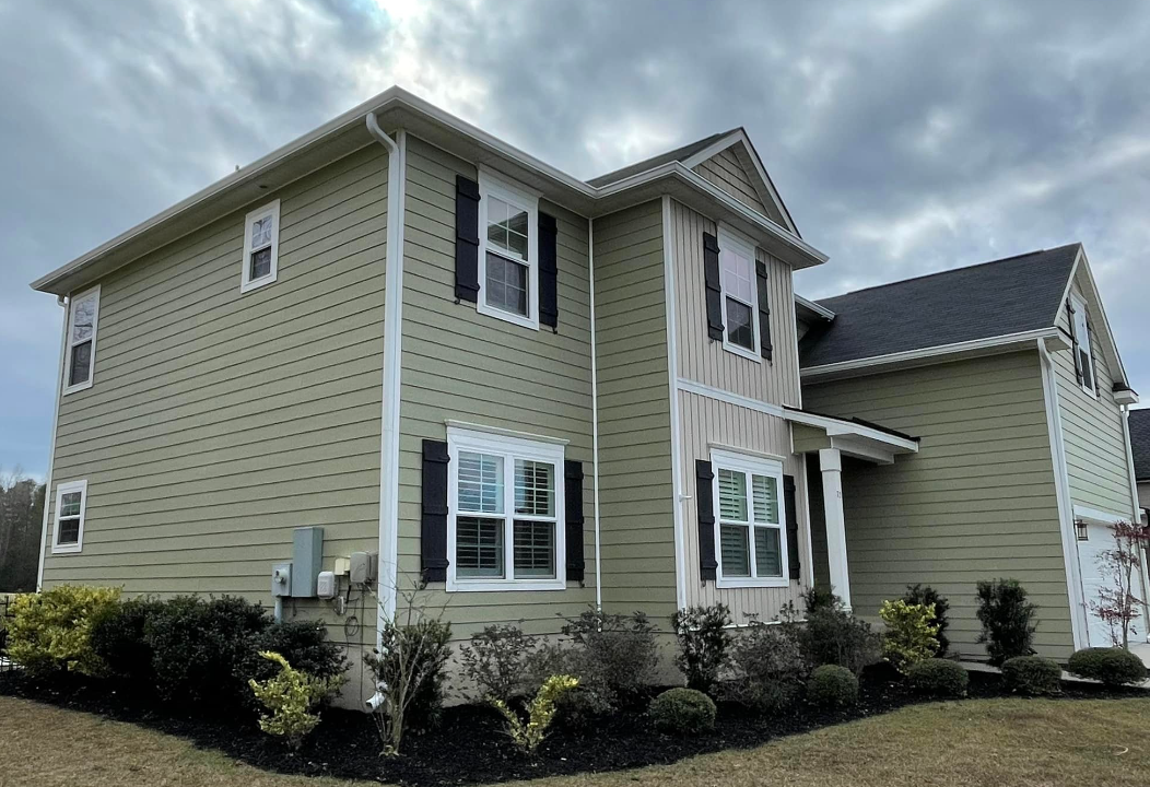 A House With A Lot Of Windows And Black Shutters — Richmond Hill, GA — A Plus