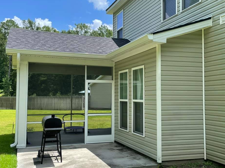 A Screened In Porch With A Grill On It — Richmond Hill, GA — A Plus