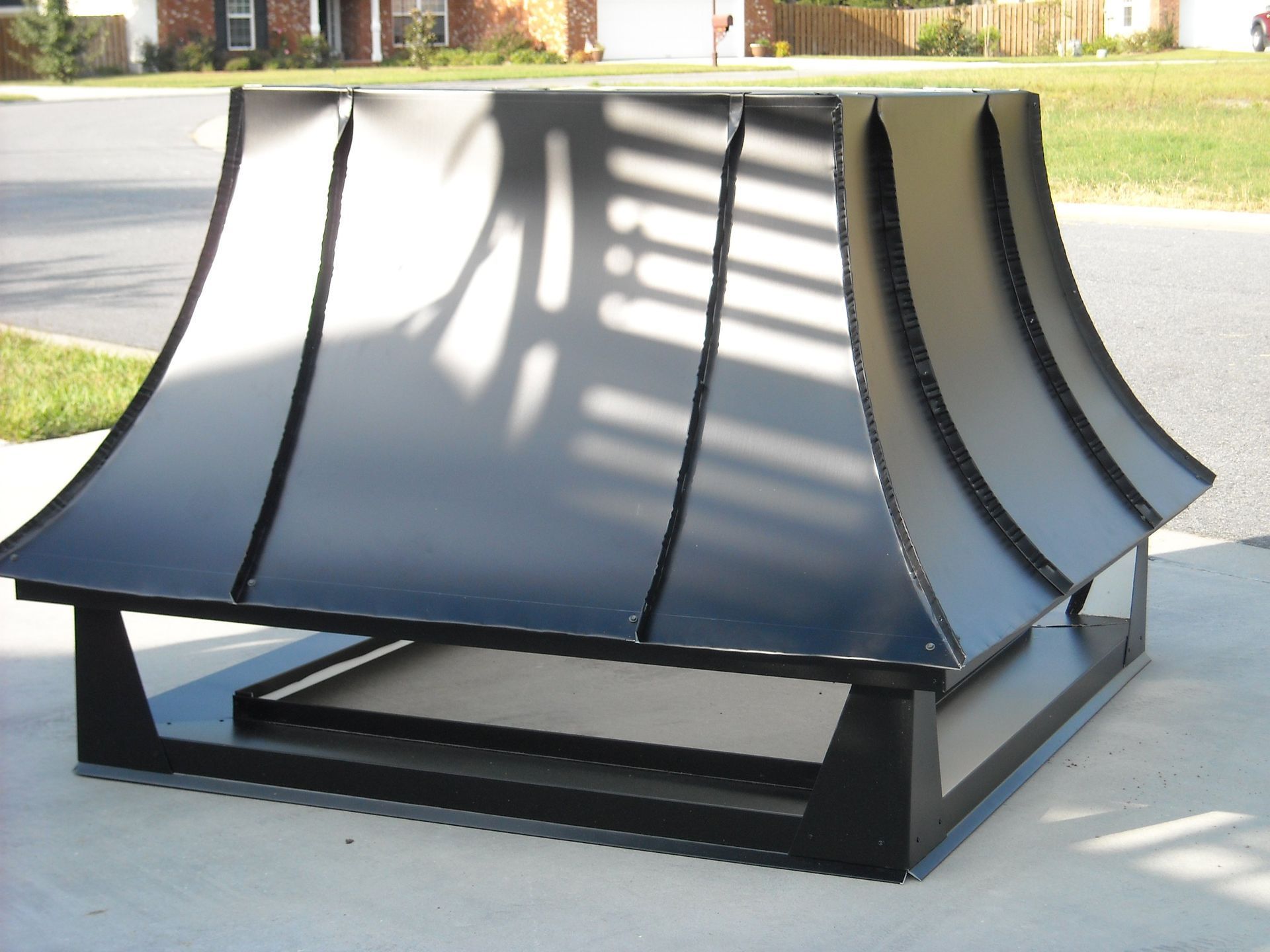 A Black Metal Object Is Sitting On The Side Of The Road — Richmond Hill, GA — A Plus