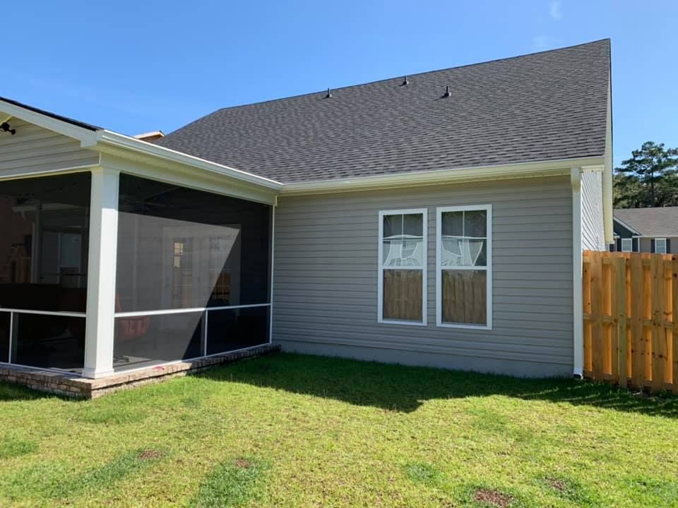 A House With A Screened In Porch And Two Windows — Richmond Hill, GA — A Plus
