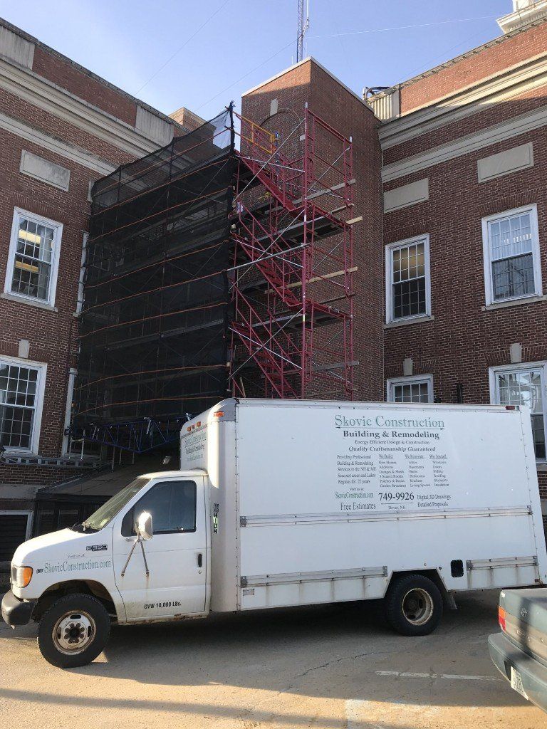 Insulation — White Van on Front House in Dover, NH