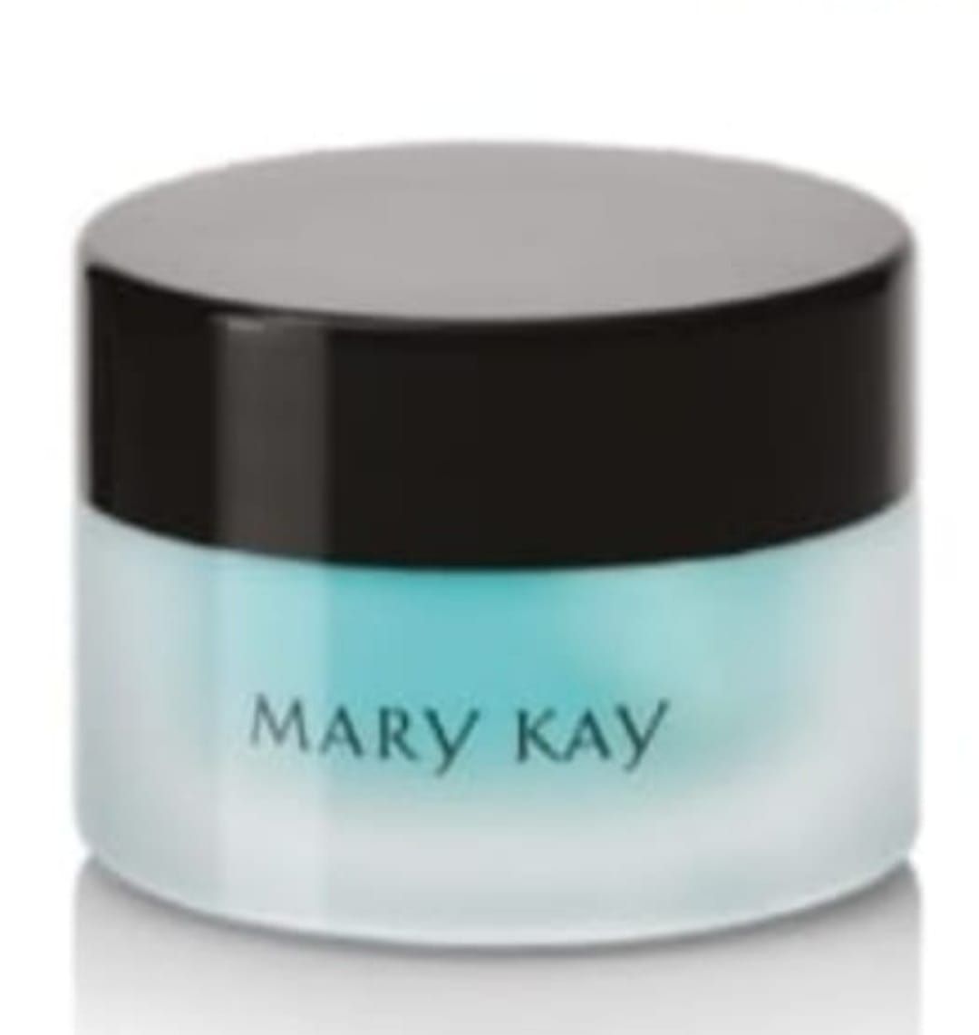 Frasco pequeño de crema para ojos Mary Kay; azul esmerilado con tapa negra.