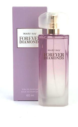 Frasco y caja de perfume Mary Kay Forever Diamonds, degradado violeta claro, fondo blanco.